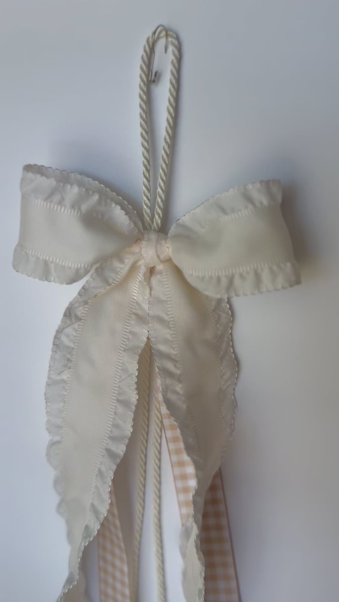 Ribbon Journal - Chloe: 1.5in ivory scalloped edge ribbon with beige gingham center ribbons. $25 each. © Foshee Design Studio 2024